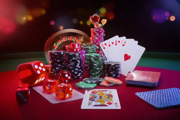 A player using their smartphone during a festive local event, representing 33L’s fully mobile-friendly casino.