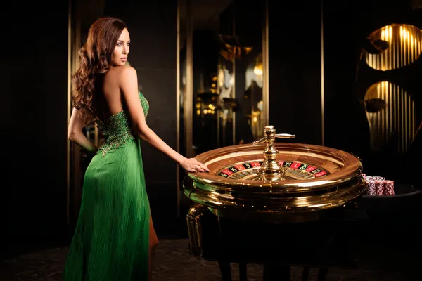 A person using their device against a moody casino-themed background, illustrating the smooth re-entry process at 33L.